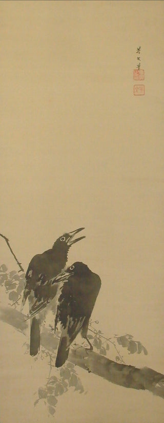 Two crows on a branch