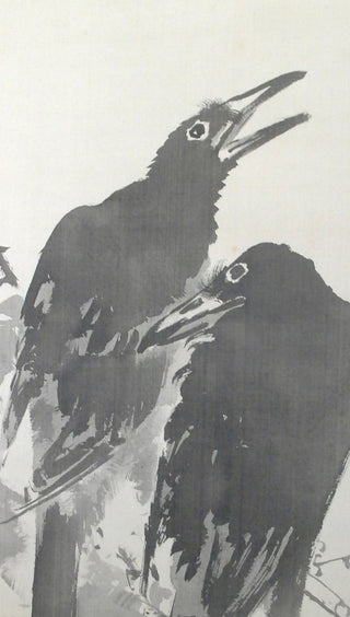 Two crows on a branch