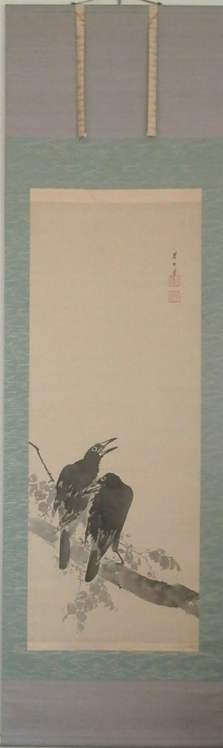 Two crows on a branch