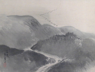 Geese passing the mountains in autumn