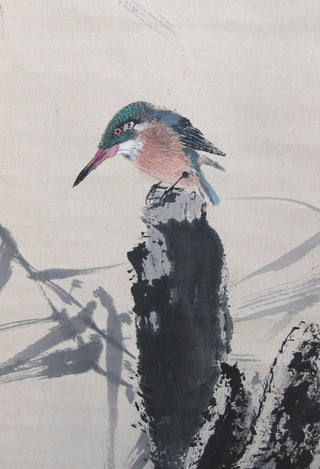 Eisvogel auf einer Stange