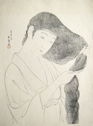 Woman combing her hair