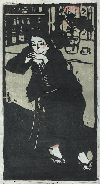 Žena v kavárně