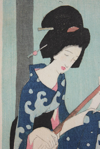 Young Woman playing the shamisen