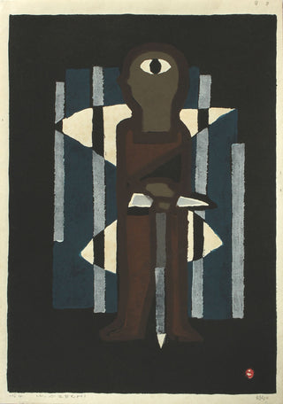 Mountaineer standing in a forest