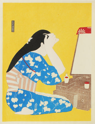 Woman Seated in front of a mirror